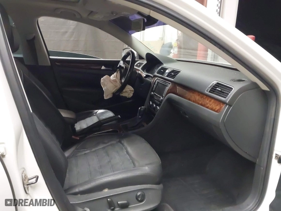 2013 Volkswagen Passat TDI SEL Premium with VIN 1VWCN7A39DC011421, listed as a IAAI auction lot 42042189 with 141,670 mi miles. Bid and sale history available at carsss.com. Image 5.