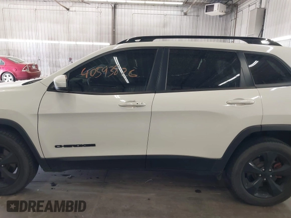 2019 Jeep Cherokee Latitude Plus with VIN 1C4PJMLBXKD294213, listed as a IAAI auction lot 40593826 with 107,332 mi miles. Bid and sale history available at carsss.com. Image 15.