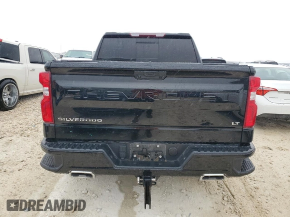 2022 Chevrolet Silverado 1500 LT Trail Boss with VIN 3GCUDFET5NG654765, listed as a Copart auction lot 82947694 with 77,747 mi miles and Salvage Title. Bid and sale history available at DreamBid. Image 6.