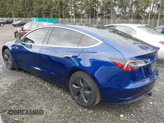 2019 Tesla Model 3 Long Range with VIN 5YJ3E1EB8KF512950, listed as a IAAI auction lot 41836349 with 55,607 mi miles and . Bid and sale history available at DreamBid. Image 3.