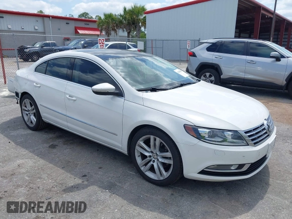 2014 Volkswagen CC Executive z VIN WVWRP7AN7EE537318, wystawiony jako IAAI lot #42308532 z przebiegiem 217 059 mil mil oraz . Historia ofert i sprzedaży dostępna na DreamBid. Obrazek 1.
