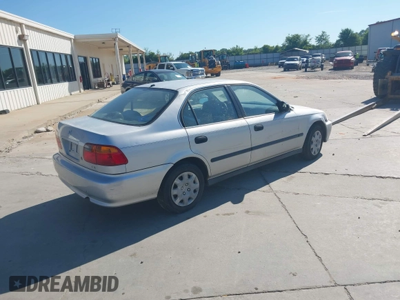 1999 Honda Civic LX with VIN 2HGEJ6678XH581295, listed as a IAAI auction lot 41550824 with 152,277 mi miles and . Bid and sale history available at DreamBid. Image 4.