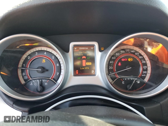 2013 Dodge Journey Crew with VIN 3C4PDCCG8DT701083, listed as a Copart auction lot 48292095 with 129,494 mi miles and Clean title. Bid and sale history available at DreamBid. Image 9.