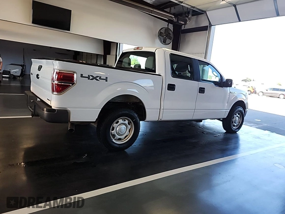 2014 Ford F-150 XL with VIN 1FTFW1EF0EKD95627, listed as a IAAI auction lot 42743975 with 228,877 mi miles and . Bid and sale history available at DreamBid. Image 33.
