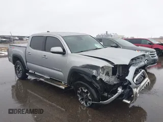 2020 Toyota Tacoma SR5 z VIN 3TMCZ5AN9LM290069, wystawiony jako IAAI lot #41938380 z przebiegiem 131 439 mil mil oraz . Historia ofert i sprzedaży dostępna na DreamBid. Obrazek 1.