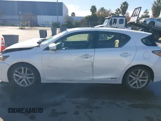 2014 Lexus CT 200h with VIN JTHKD5BH5E2203604, listed as a IAAI auction lot 41372030 with 147,449 mi miles and . Bid and sale history available at DreamBid. Image 14.