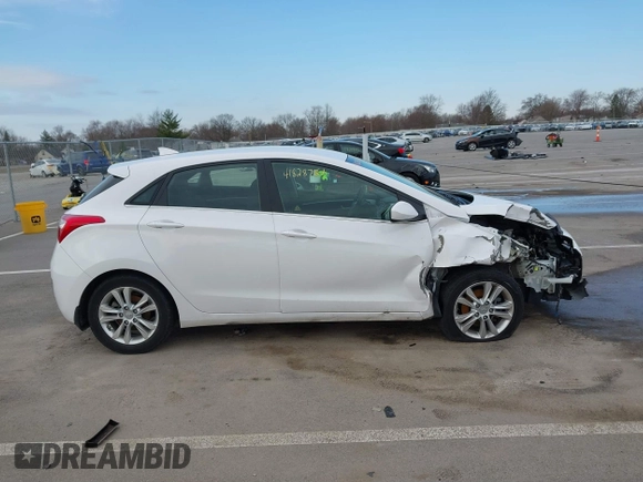 2013 Hyundai Elantra GT with VIN KMHD35LE1DU145894, listed as a IAAI auction lot 41828751 with 90,529 mi miles. Bid and sale history available at carsss.com. Image 13.