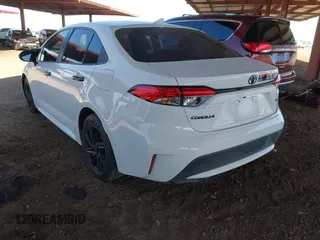 2020 Toyota Corolla LE with VIN 5YFEPRAE2LP144904, listed as a IAAI auction lot 41767334 with 94,364 mi miles. Bid and sale history available at carsss.com. Image 3.