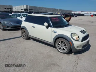 2007 MINI Hardtop S with VIN WMWMF73517TL83792, listed as a IAAI auction lot 42680017 with 135,631 mi miles and . Bid and sale history available at DreamBid. Image 1.