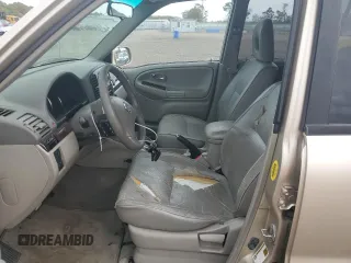 2006 Suzuki XL7 z VIN JS3TX92V564101429, wystawiony jako Copart lot #71942934 z przebiegiem 96 997 mil mil oraz Szkoda całkowita • Salvage title. Historia ofert i sprzedaży dostępna na DreamBid. Obrazek 7.