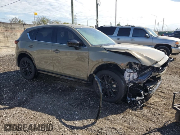 2024 Mazda CX-5 2.5 Carbon Turbo with VIN JM3KFBAYXR0521660, listed as a Copart auction lot 42415895 with 4,857 mi miles and Clean Title. Bid and sale history available at carsss.com. Image 4.