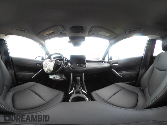 2023 Toyota Corolla Cross XLE with VIN 7MUEAAAG7PV065106, listed as a IAAI auction lot 42168195 with 6,519 mi miles and . Bid and sale history available at DreamBid. Image 18.