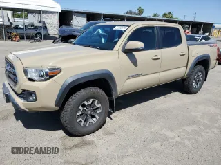 2017 Toyota Tacoma SR5 z VIN 3TMCZ5AN3HM076931, wystawiony jako Copart lot #57602975 z przebiegiem 98 824 mil mil oraz Szkoda całkowita • Salvage title. Historia ofert i sprzedaży dostępna na DreamBid. Obrazek 1.