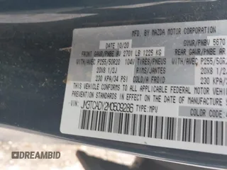 2021 Mazda CX-9 Grand Touring with VIN JM3TCADY2M0509286, listed as a IAAI auction lot 39976279 with 93,588 mi miles and . Bid and sale history available at DreamBid. Image 9.