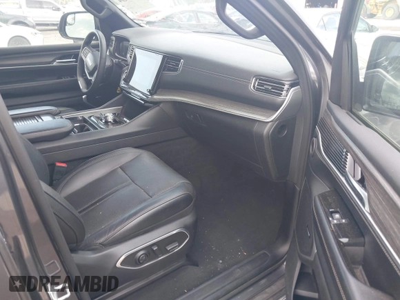 2023 Jeep Wagoneer Series II with VIN 1C4SJVBPXPS515874, listed as a IAAI auction lot 42728894 with 56,284 mi miles and . Bid and sale history available at DreamBid. Image 5.