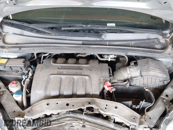 2008 Honda Odyssey LX with VIN 5FNRL38258B064490, listed as a IAAI auction lot 42228533 with 126,043 mi miles and . Bid and sale history available at DreamBid. Image 10.
