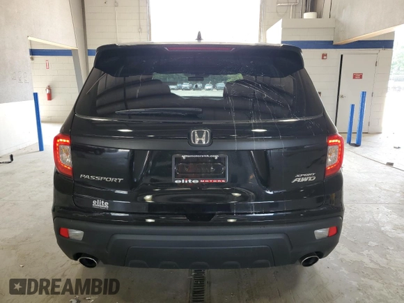 2021 Honda Passport Sport with VIN 5FNYF8H28MB044003, listed as a Copart auction lot 59773225 with 60,855 mi miles and Salvage title. Bid and sale history available at DreamBid. Image 6.