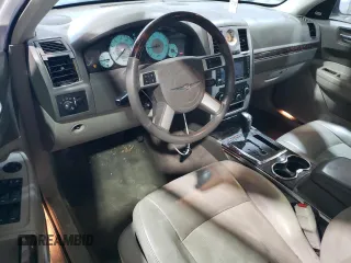 2010 Chrysler 300 with VIN 2C3CA6CT8AH329985, listed as a Copart auction lot 84556624 with 165,348 mi miles and Salvage Title. Bid and sale history available at carsss.com. Image 8.