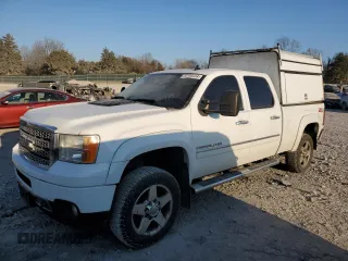 2011 GMC Sierra 2500HD Denali with VIN 1GT125CG4BF136605, listed as a Copart auction lot 83184234 with 221,476 mi miles and Salvage title. Bid and sale history available at DreamBid. Image 1.