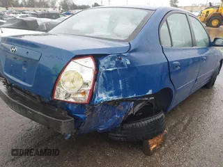 2005 Hyundai Elantra GLS z VIN KMHDN46D35U925338, wystawiony jako IAAI lot #41563165 z przebiegiem 88 776 mil mil oraz . Historia ofert i sprzedaży dostępna na DreamBid. Obrazek 18.