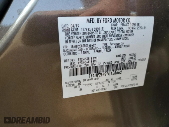 2015 Ford Taurus SEL with VIN 1FAHP2E82FG158662, listed as a Copart auction lot 58233875 with 159,174 mi miles and Salvage title. Bid and sale history available at DreamBid. Image 12.