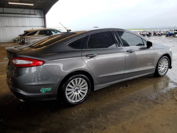 2014 Ford Fusion Energi Titanium with VIN 3FA6P0SU3ER178097, listed as a Copart auction lot 43999655 with 211,675 mi miles and Salvage Title. Bid and sale history available at carsss.com. Image 3.