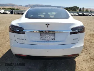 2017 Tesla Model S 100D с VIN 5YJSA1E27HF199003, выставлен на аукционе Copart как лот 59214775 с пробегом 99 673 миль миль и Списание • Salvage title. История ставок и продаж доступна на DreamBid. Изображение 6.