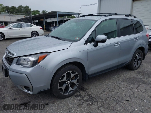 2014 Subaru Forester XT Touring with VIN JF2SJGMC1EH552474, listed as a IAAI auction lot 42461663 with 121,482 mi miles and . Bid and sale history available at DreamBid. Image 18.