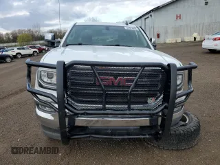 2019 GMC Sierra 1500 SLE z VIN 2GTV2MEC0K1170652, wystawiony jako Copart lot #53474495 z przebiegiem 58 181 mil mil oraz Czysty tytuł • Clean title. Historia ofert i sprzedaży dostępna na DreamBid. Obrazek 5.