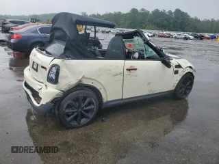 2014 MINI Convertible S с VIN WMWZP3C5XET706231, выставлен на аукционе Copart как лот 55610615 с пробегом 70 416 миль миль и Списание • Salvage title. История ставок и продаж доступна на DreamBid. Изображение 3.