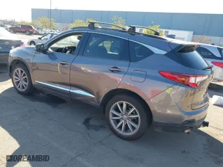 2019 Acura RDX w/Technology Pkg with VIN 5J8TC2H51KL000186, listed as a IAAI auction lot 41403335 with 140,920 mi miles. Bid and sale history available at carsss.com. Image 3.