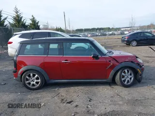 2009 MINI Clubman z VIN WMWML33509TP98297, wystawiony jako IAAI lot #41092163 z przebiegiem 101 011 mil mil oraz . Historia ofert i sprzedaży dostępna na DreamBid. Obrazek 13.