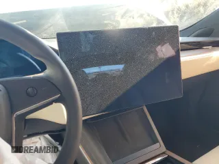 2023 Tesla Model S with VIN 5YJSA1E59PF522444, listed as a Copart auction lot 49835095 with Not provided miles and Salvage title. Bid and sale history available at DreamBid. Image 9.