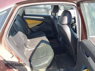 2012 Volkswagen Passat SE z VIN 1VWBH7A32CC074412, wystawiony jako IAAI lot #41805569 z przebiegiem 216 762 mil mil oraz . Historia ofert i sprzedaży dostępna na DreamBid. Obrazek 8.