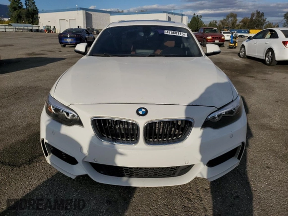 2015 BMW 2 Series 228i with VIN WBA1F9C54FVW98698, listed as a Copart auction lot 47660115 with 91,221 mi miles and Salvage Title. Bid and sale history available at carsss.com. Image 5.