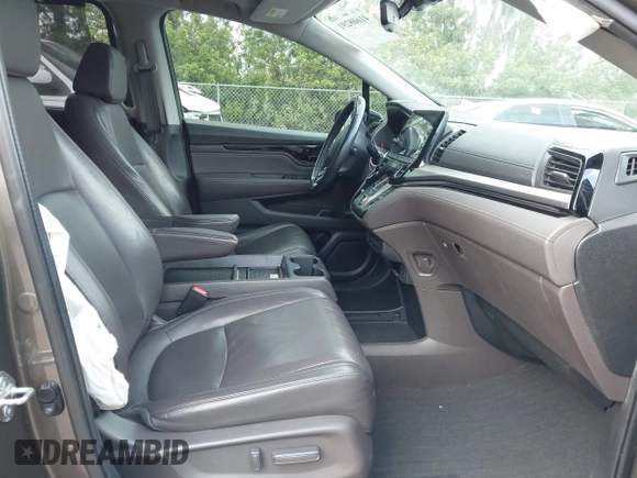 2020 Honda Odyssey Elite with VIN 5FNRL6H91LB030294, listed as a IAAI auction lot 41608291 with 74,477 mi miles and . Bid and sale history available at DreamBid. Image 5.