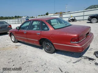 1997 Ford Crown Victoria LX with VIN 2FALP74W7VX148869, listed as a Copart auction lot 69004924 with 226,648 mi miles and Salvage Title. Bid and sale history available at carsss.com. Image 2.