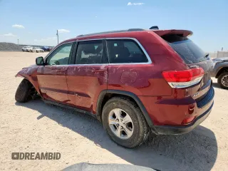2017 Jeep Grand Cherokee Laredo with VIN 1C4RJFAG7HC693789, listed as a Copart auction lot 61827925 with 143,019 mi miles and Salvage title. Bid and sale history available at DreamBid. Image 2.