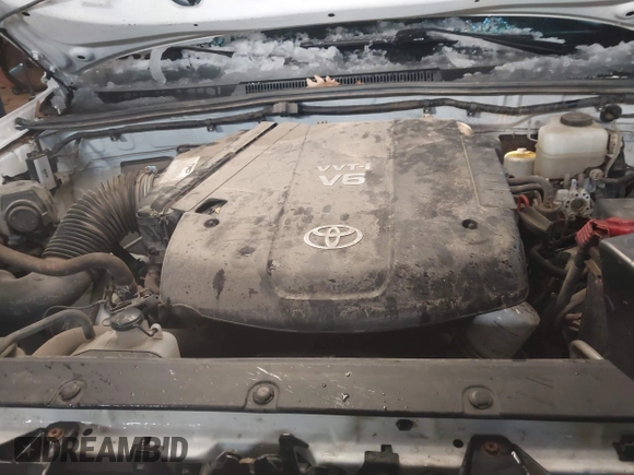 2013 Toyota Tacoma with VIN 3TMLU4EN2DM104490, listed as a IAAI auction lot 41636616 with 153,036 mi miles and . Bid and sale history available at DreamBid. Image 10.