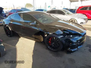 2023 Tesla Model S Plaid with VIN 5YJSA1E66PF518117, listed as a IAAI auction lot 41344515 with Not provided miles and . Bid and sale history available at DreamBid. Image 1.
