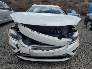 2015 Volvo V60 z VIN YV1902SS6F1228244, wystawiony jako Copart lot #43789925 z przebiegiem 69 835 mil mil oraz Szkoda całkowita • Salvage title. Historia ofert i sprzedaży dostępna na DreamBid. Obrazek 5.