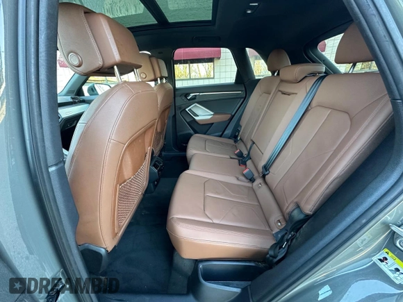 2021 Audi Q3 Premium z VIN WA1AUCF3XM1102363, wystawiony jako Copart lot #58672195 z przebiegiem 208 956 mil mil oraz Czysty tytuł • Clean title. Historia ofert i sprzedaży dostępna na DreamBid. Obrazek 6.
