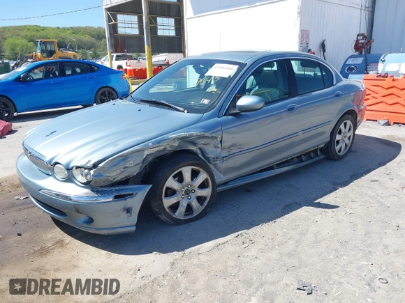 2004 Jaguar X-Type with VIN SAJEA51C64WD99643, listed as a IAAI auction lot 42086360 with 134,126 mi miles and . Bid and sale history available at DreamBid. Image 2.