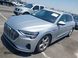 2019 Audi e-tron Prestige with VIN WA1VAAGE9KB010814, listed as a IAAI auction lot 42632795 with 90,497 mi miles and . Bid and sale history available at DreamBid. Image 2.