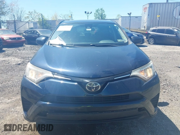 2017 Toyota RAV4 LE with VIN JTMBFREV8HJ168975, listed as a IAAI auction lot 42139354 with 91,394 mi miles and . Bid and sale history available at DreamBid. Image 12.