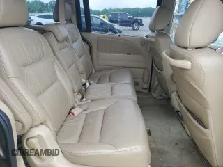 2010 Honda Odyssey Touring z VIN 5FNRL3H97AB082525, wystawiony jako Copart lot #56410845 z przebiegiem 94 819 mil mil oraz Szkoda całkowita • Salvage title. Historia ofert i sprzedaży dostępna na DreamBid. Obrazek 10.