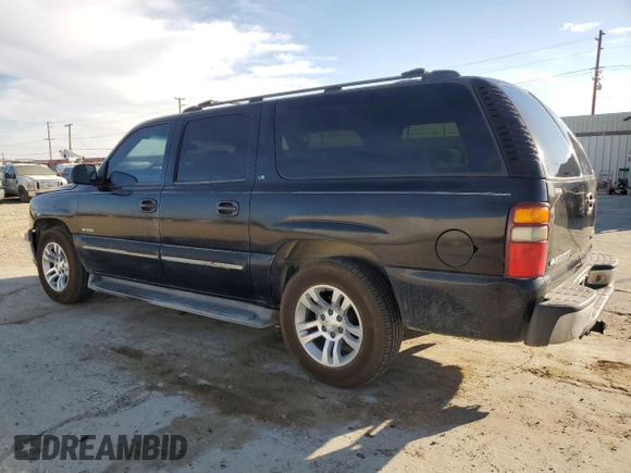 2000 Chevrolet Suburban LS with VIN 3GNEC16T6YG141156, listed as a Copart auction lot 75569064 with 246,247 mi miles and Salvage title. Bid and sale history available at DreamBid. Image 2.