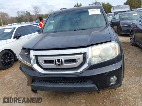 2011 Honda Pilot EX-L with VIN 5FNYF3H69BB043509, listed as a IAAI auction lot 41127719 with 241,167 mi miles and . Bid and sale history available at DreamBid. Image 12.
