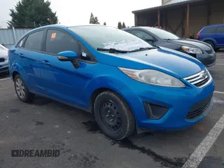 2013 Ford Fiesta SE z VIN 3FADP4BJ9DM177889, wystawiony jako IAAI lot #41478043 z przebiegiem 243 035 mil mil oraz . Historia ofert i sprzedaży dostępna na DreamBid. Obrazek 1.