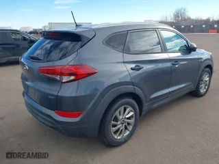 2016 Hyundai Tucson SE with VIN KM8J3CA43GU090127, listed as a IAAI auction lot 41488094 with 122,676 mi miles. Bid and sale history available at carsss.com. Image 4.